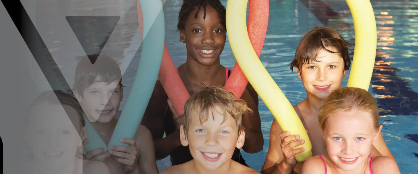 Kids in the pool at YMCA during Aqua Explorers camps